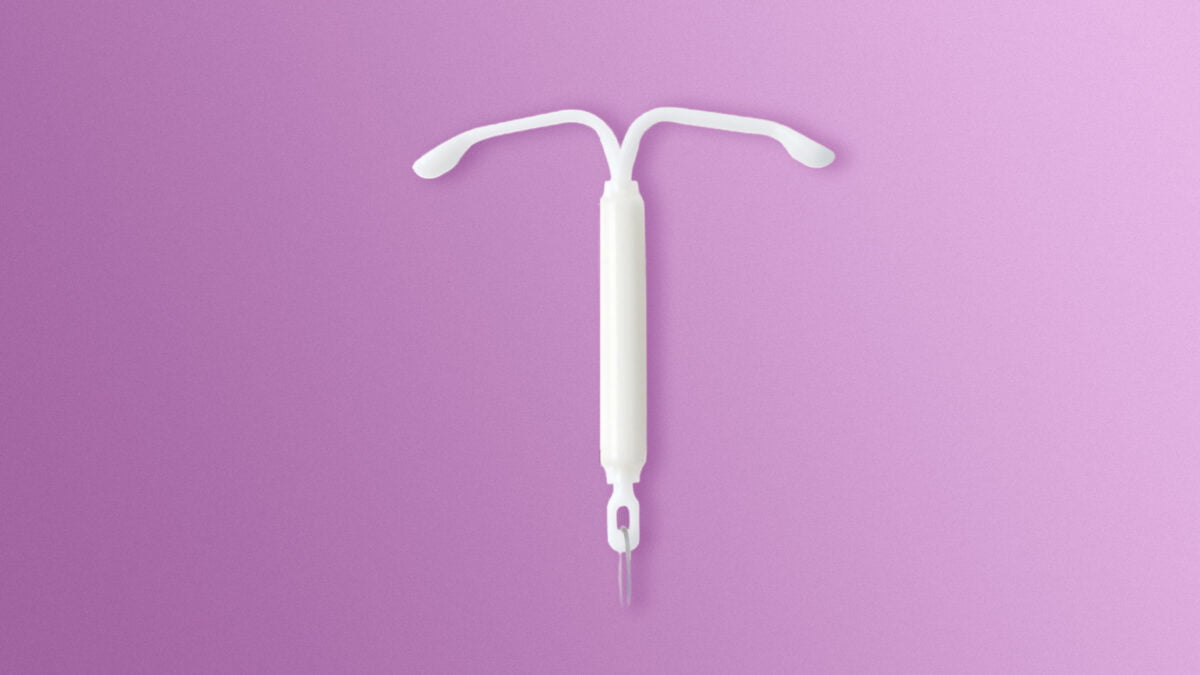 Image of a Mirena Contraceptive Coil on a purple background