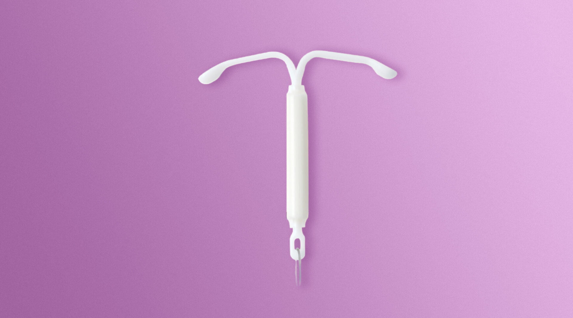 Image of a Mirena Contraceptive Coil on a purple background